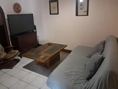 Coin salon dans l'établissement Petite maison de bourg