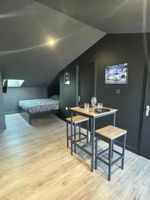 Un ou plusieurs lits dans un hébergement de l'établissement racing room