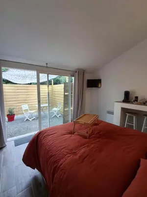Un ou plusieurs lits dans un hébergement de l'établissement Chambre suite avec terrasse