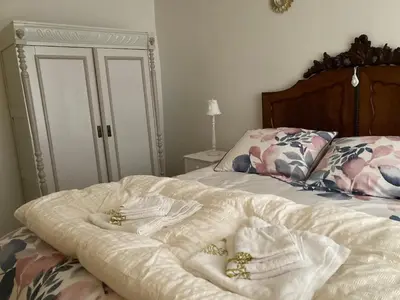 Un ou plusieurs lits dans un hébergement de l'établissement Villa Krystina Gîte de Charme