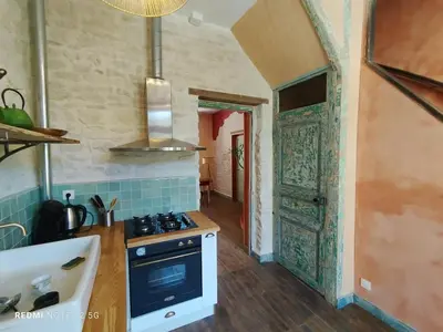 Cuisine ou kitchenette dans l'établissement Les Studios Grenouilles