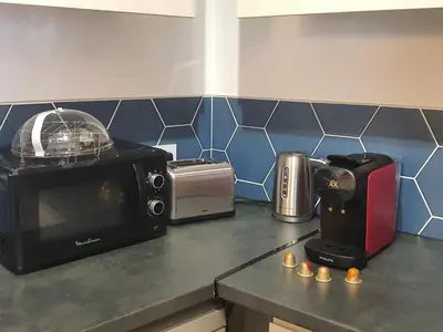 Cuisine ou kitchenette dans l'établissement Le Refuge de la Plage