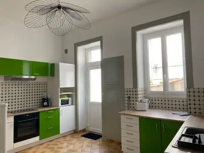 Cuisine ou kitchenette dans l'établissement Chambres centre ville Chateauneuf