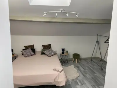 Un ou plusieurs lits dans un hébergement de l'établissement Chambres centre ville Chateauneuf
