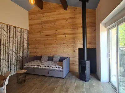 Un ou plusieurs lits dans un hébergement de l'établissement Studio mezzanine chez des mushers