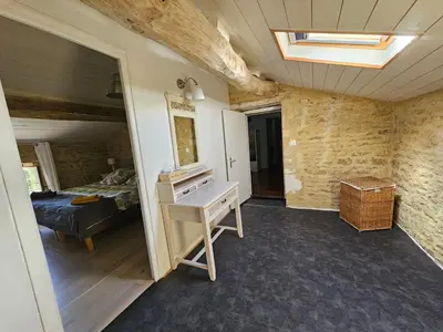 Un ou plusieurs lits dans un hébergement de l'établissement Maison Charentaise avec piscine et boulodrome