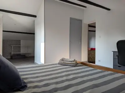 Un ou plusieurs lits dans un hébergement de l'établissement Apartment