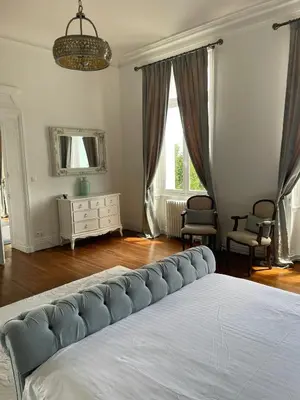Un ou plusieurs lits dans un hébergement de l'établissement Chateau de Minargent