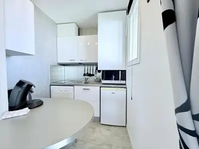 Cuisine ou kitchenette dans l'établissement Le Quai des Étoiles