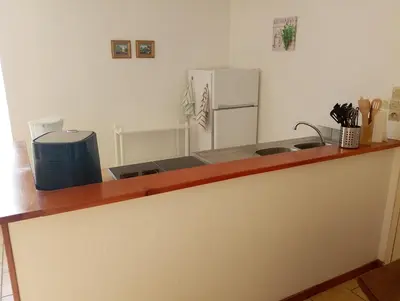 Cuisine ou kitchenette dans l'établissement Namasté 'Au vieux Poitiers'
