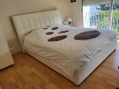 Un ou plusieurs lits dans un hébergement de l'établissement COSY Home 10 min à pied de l'hyper centre