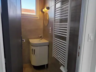 Salle de bains dans l'établissement Appartement T3 idéalement situé
