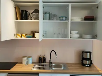 Cuisine ou kitchenette dans l'établissement L' Abreuvoir