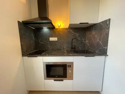 Cuisine ou kitchenette dans l'établissement El Nido - Numéro 3