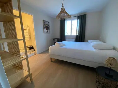 Un ou plusieurs lits dans un hébergement de l'établissement Magnifique Vue Vieux Port et Tours de La Rochelle - Appartement 120m2 - Les Suites du Trente