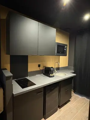 Cuisine ou kitchenette dans l'établissement La Romantique