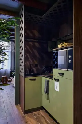 Cuisine ou kitchenette dans l'établissement Love Room Évasion tropicale à deux pas du centre