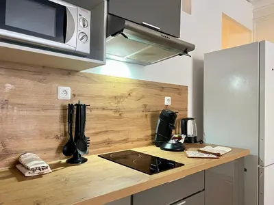 Cuisine ou kitchenette dans l'établissement Beautiful 2 bedroom apartment in downtown Poitiers