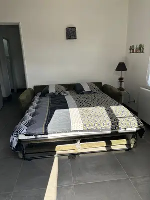 Un ou plusieurs lits dans un hébergement de l'établissement Chez Céline et Frédéric maison 3 T2 45m2