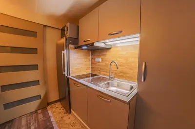 Cuisine ou kitchenette dans l'établissement Idéal pour la famille proche du Futuroscope