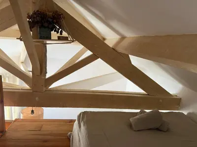 Un ou plusieurs lits dans un hébergement de l'établissement Maison de village au cœur du Marais Poitevin