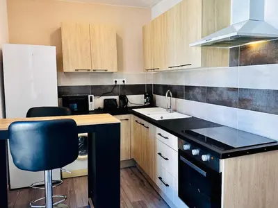 Cuisine ou kitchenette dans l'établissement Le Simplicity - Hyper Centre Cognac - wifi - stationnement