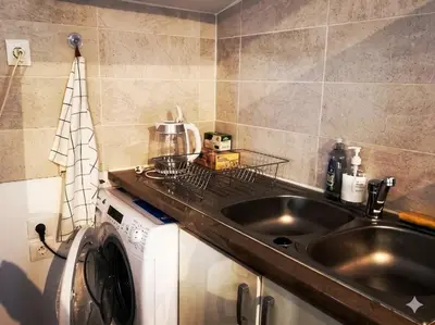 Cuisine ou kitchenette dans l'établissement 10minutes Futuroscope & Cœur de Poitiers