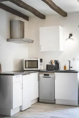 Cuisine ou kitchenette dans l'établissement Le gite du manoir