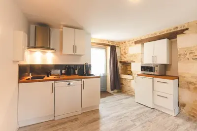Cuisine ou kitchenette dans l'établissement Le gite du puits