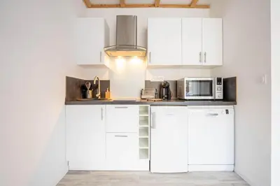 Cuisine ou kitchenette dans l'établissement Le gite de l'olivier