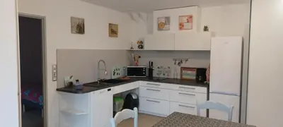 Cuisine ou kitchenette dans l'établissement Gite de la butte bis