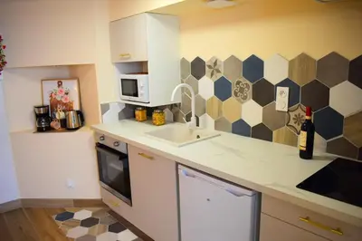 Cuisine ou kitchenette dans l'établissement La Verrière