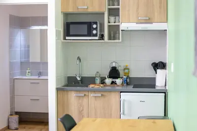 Cuisine ou kitchenette dans l'établissement Le Saint Colette #Parking privé et sécurisé