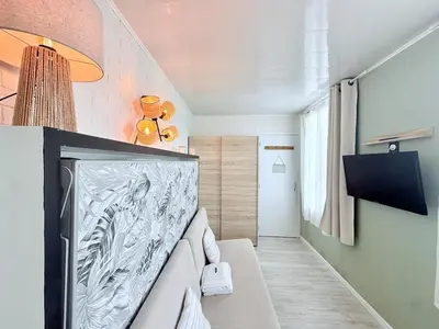 Télévision ou salle de divertissement dans l'établissement Le Chanzy