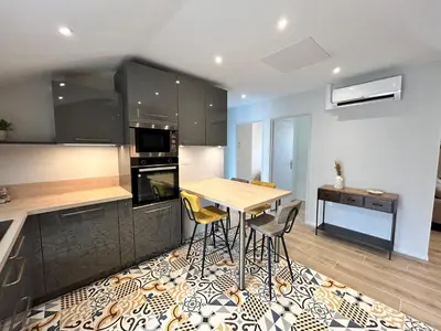 Cuisine ou kitchenette dans l'établissement Appartement centre de Poitiers