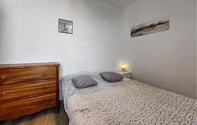 Un ou plusieurs lits dans un hébergement de l'établissement Awesome Apartment In Châtelaillon-Plage With Wifi