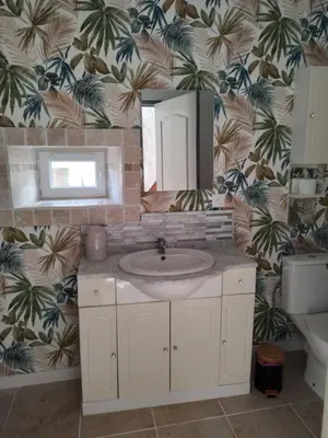 Salle de bains dans l'établissement Le pti' robin