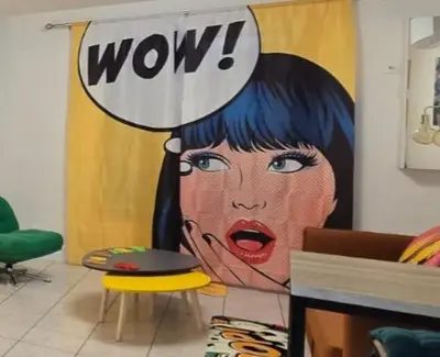 Coin salon dans l'établissement Nouveau ! Le Pop Appart - Fun et coloré en hypercentre de Surgères