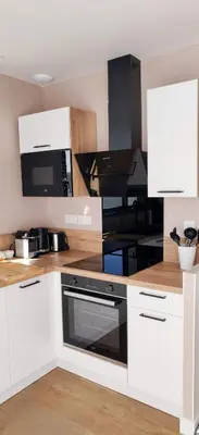 Cuisine ou kitchenette dans l'établissement Petite maison cosy