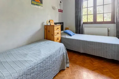 Un ou plusieurs lits dans un hébergement de l'établissement House for 13 people, heated pool, bocce court