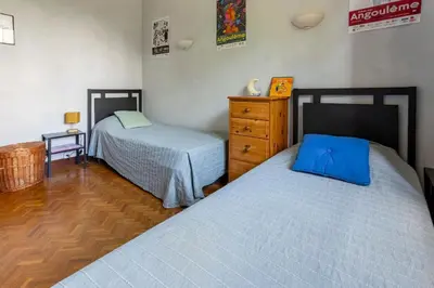 Un ou plusieurs lits dans un hébergement de l'établissement Maison 15p piscine chauffé terrain de pétanque