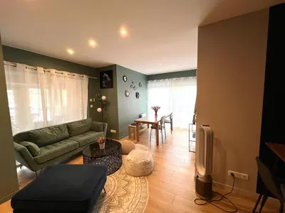 Coin salon dans l'établissement Le 49 Carnot Plein cœur de Poitiers