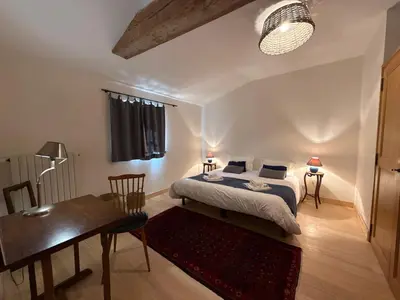 Un ou plusieurs lits dans un hébergement de l'établissement La Villa des Licoches, gite Proche Thouars 8 personnes
