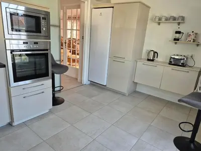 Cuisine ou kitchenette dans l'établissement Les Camelias
