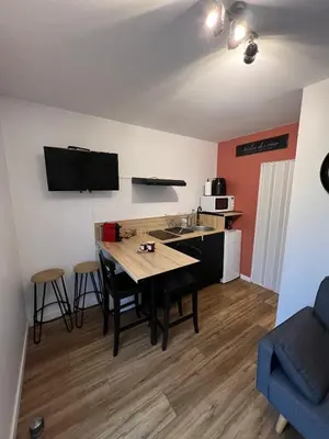 Cuisine ou kitchenette dans l'établissement Appartement avec terrasse