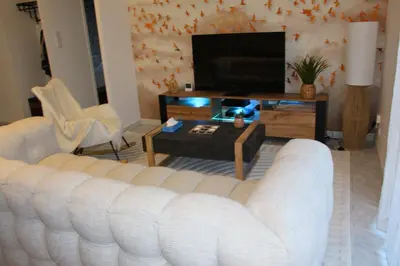 Télévision ou salle de divertissement dans l'établissement Maison cosy avec SPA - Logis Flo - à 15 min du Futuroscope