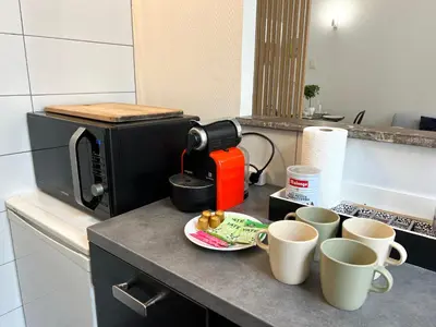 Cuisine ou kitchenette dans l'établissement ღ Belle Epoque - Hypercentre, cosy & wifi