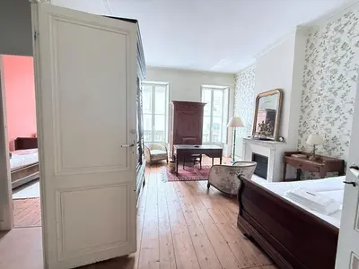 Un ou plusieurs lits dans un hébergement de l'établissement La Maison de la Glycine