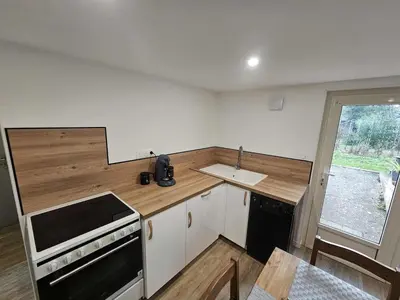 Cuisine ou kitchenette dans l'établissement Apartment