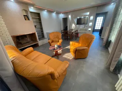 Coin salon dans l'établissement Maison familiale